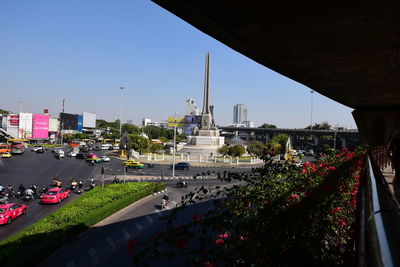 Panoramic view of street amidst buildings against clear sky
