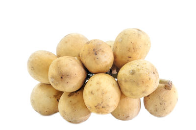 Close-up of lemons against white background