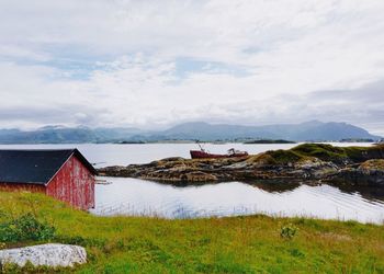 Scenic view of mountains against cloudy sky