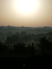 Scenic view of silhouette landscape against sky during sunset