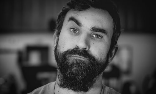 Close-up portrait of bearded man