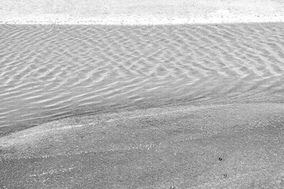 High angle view of sand dune on beach