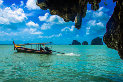 Scenic view of sea against blue sky