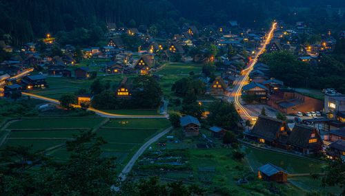 High angle view of illuminated buildings at night