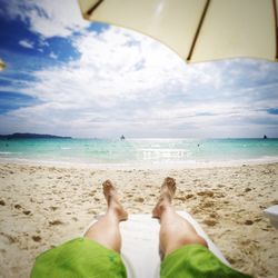 Scenic view of beach against sky