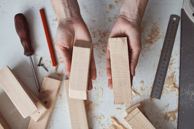 High angle view of man working on wood