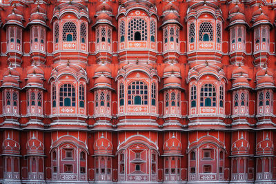 Full frame facade of ornate windows indian architecture
