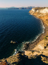 High angle view of rocks on beach against sky