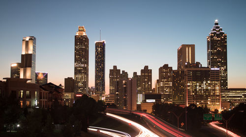 Urban skyline against sky