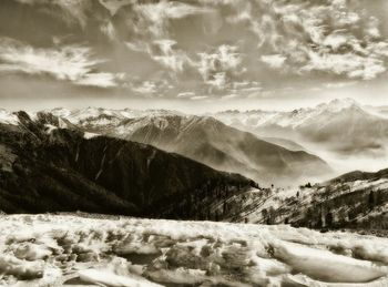 Scenic view of snow covered mountains