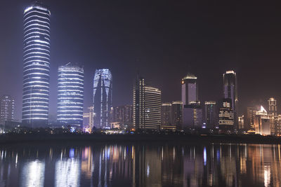 Illuminated city skyline at night