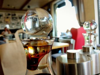 Close-up of wine glass on table