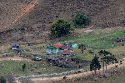 High angle view of houses on field