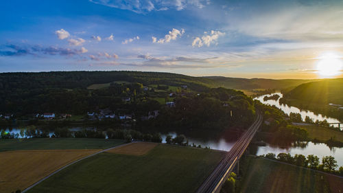 Scenic view of landscape against sky during sunset