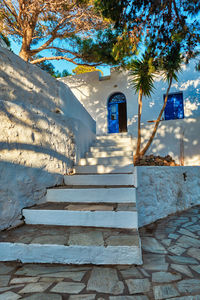 Staircase by building in city