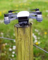 Close-up of wooden post in backyard