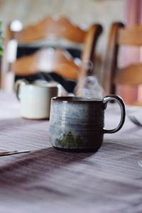 Close-up of drink in cup on table
