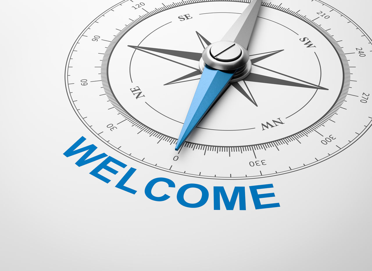 CLOSE-UP OF CLOCK ON WHITE BACKGROUND