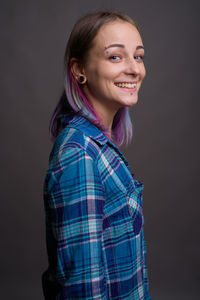 Portrait of smiling young woman