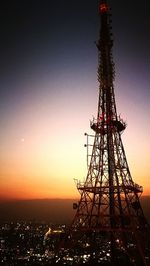 Ferris wheel against sky at night