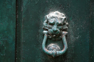 Close-up of old door knocker