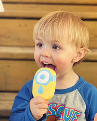 Portrait of cute girl eating ice cream