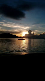 Scenic view of sea against dramatic sky