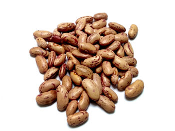 High angle view of roasted coffee on white background