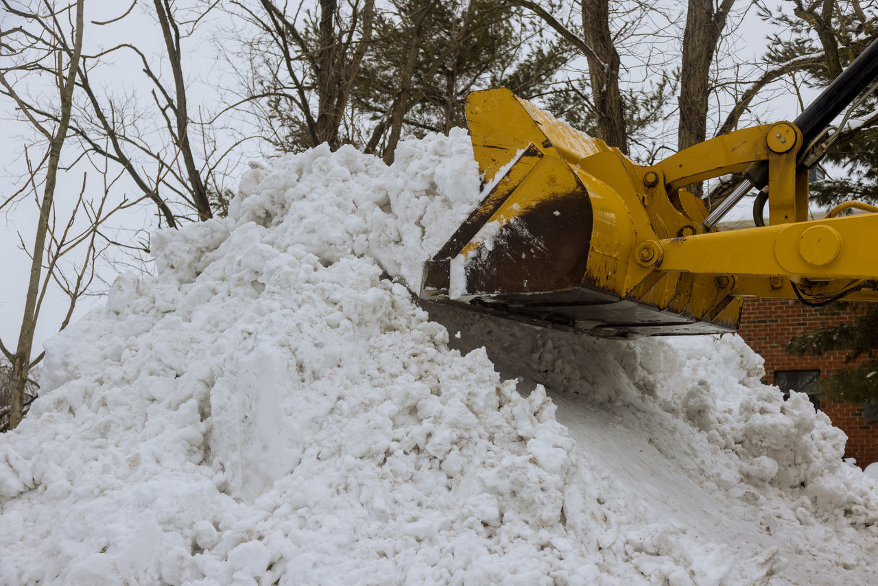 VIEW OF YELLOW CONSTRUCTION SITE ON SNOW