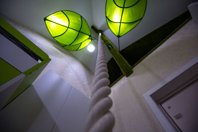Low angle view of illuminated decorations hanging from ceiling