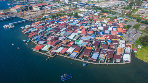 High angle view of commercial dock by sea