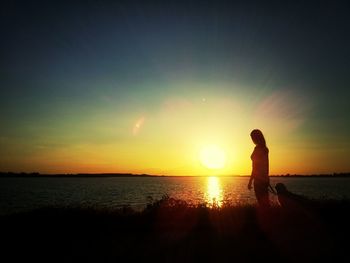 Scenic view of sea at sunset
