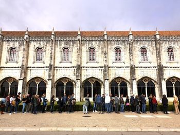 Group of people in front of building