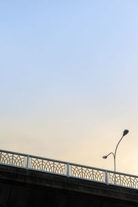 Low angle view of bridge against clear sky