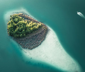 High angle view of island amidst sea