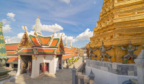 Panoramic view of temple and building against sky