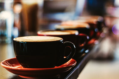 Close-up of coffee cup on table