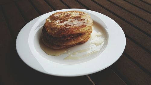 High angle view of pancakes in plate on table