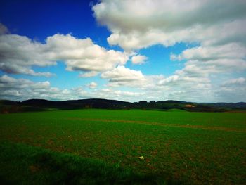 Scenic view of field against sky