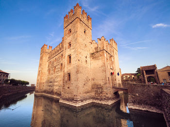 Low angle view of historic building against sky