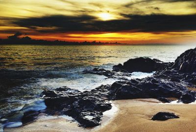 Scenic view of sea at sunset