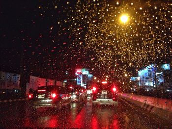 City street seen through wet window