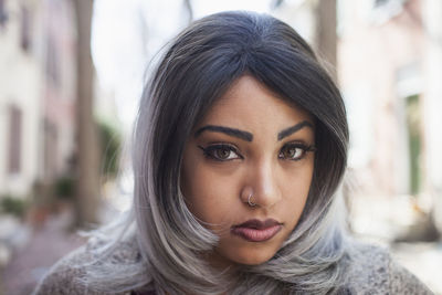 Close-up portrait of young woman