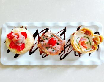 Directly above shot of dessert served in plate on table