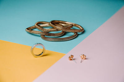 High angle view of wedding rings on table