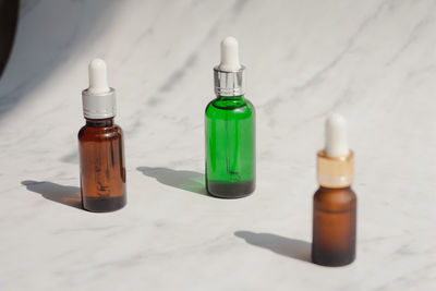 High angle view of bottles on table