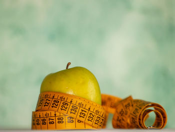 Close-up of apple against white background