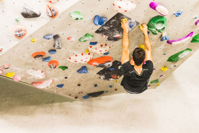 High angle view of person with arms raised