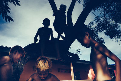 People standing against sky