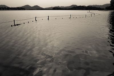 Scenic view of lake with mountains in background